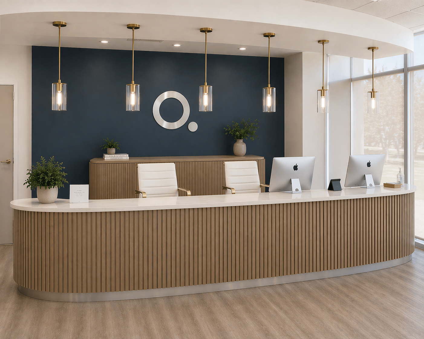 The Q Bio clinic front desk in Redwood City — a warm, daylit reception area with a curved travertine desk, exposed wood beams, and a living moss wall.